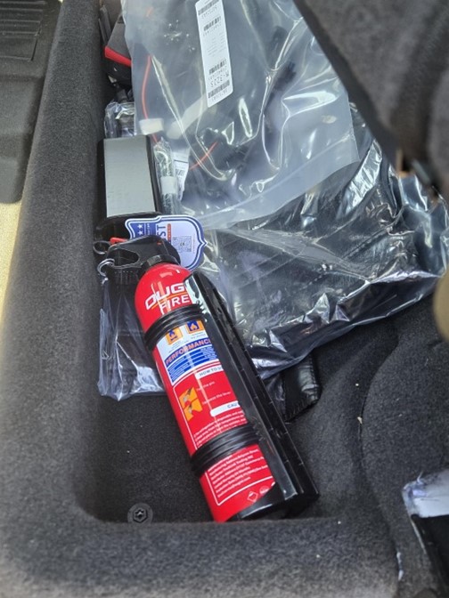 Fire extinguisher in truck.jpg